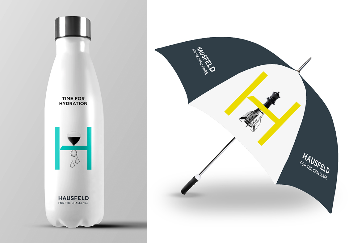 Hausfeld logo on a water bottle and umbrella